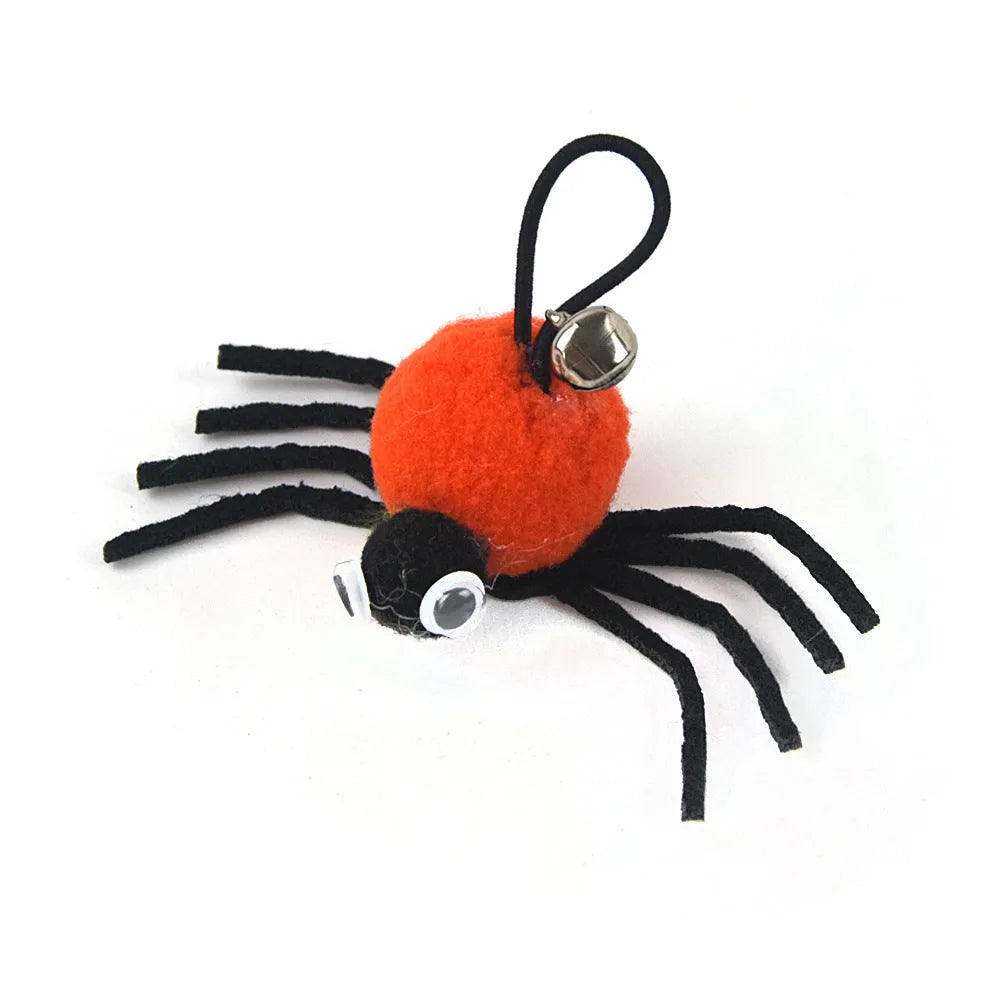 Small Halloween plush cat toy in orange red and yellow measuring 4.5 by 9 centimetres