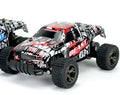 Blue and yellow 1:18 scale remote control drift car with 2.4G remote on a surface
