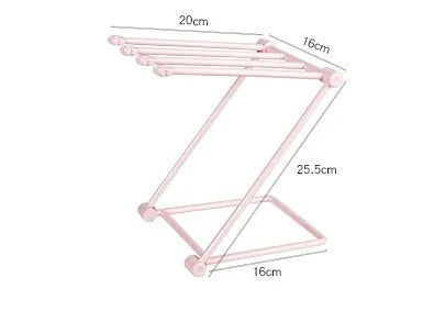 Foldable plastic dishcloth shelf organiser in light blue mounted on wall