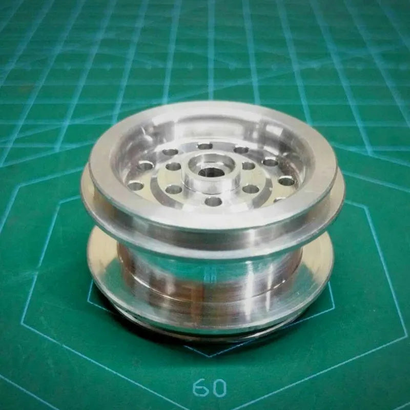 Silver stainless steel RC car wheel upgrade part with 68mm outer diameter and 5mm hexagon.