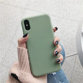 Flexible silicone phone case for iPhone in various colours including wine red and rose gold.