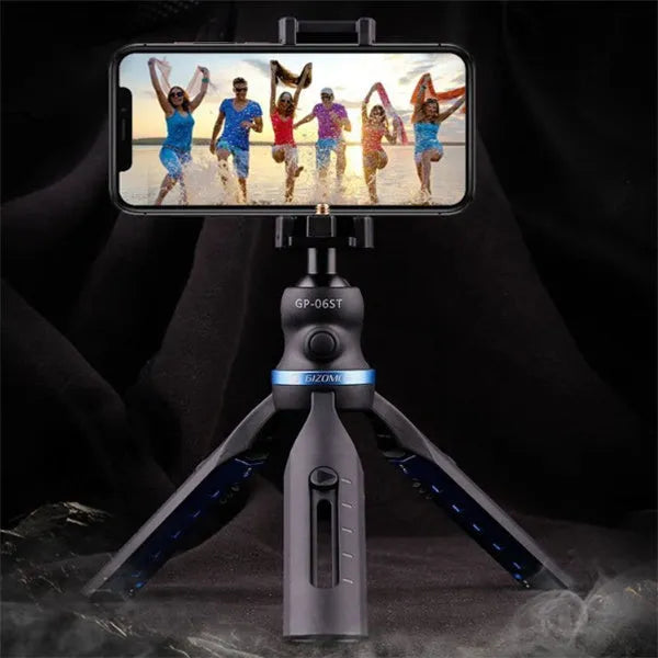 Black desktop tripod holding a mobile phone, showing adjustable bracket and plastic-aluminium construction