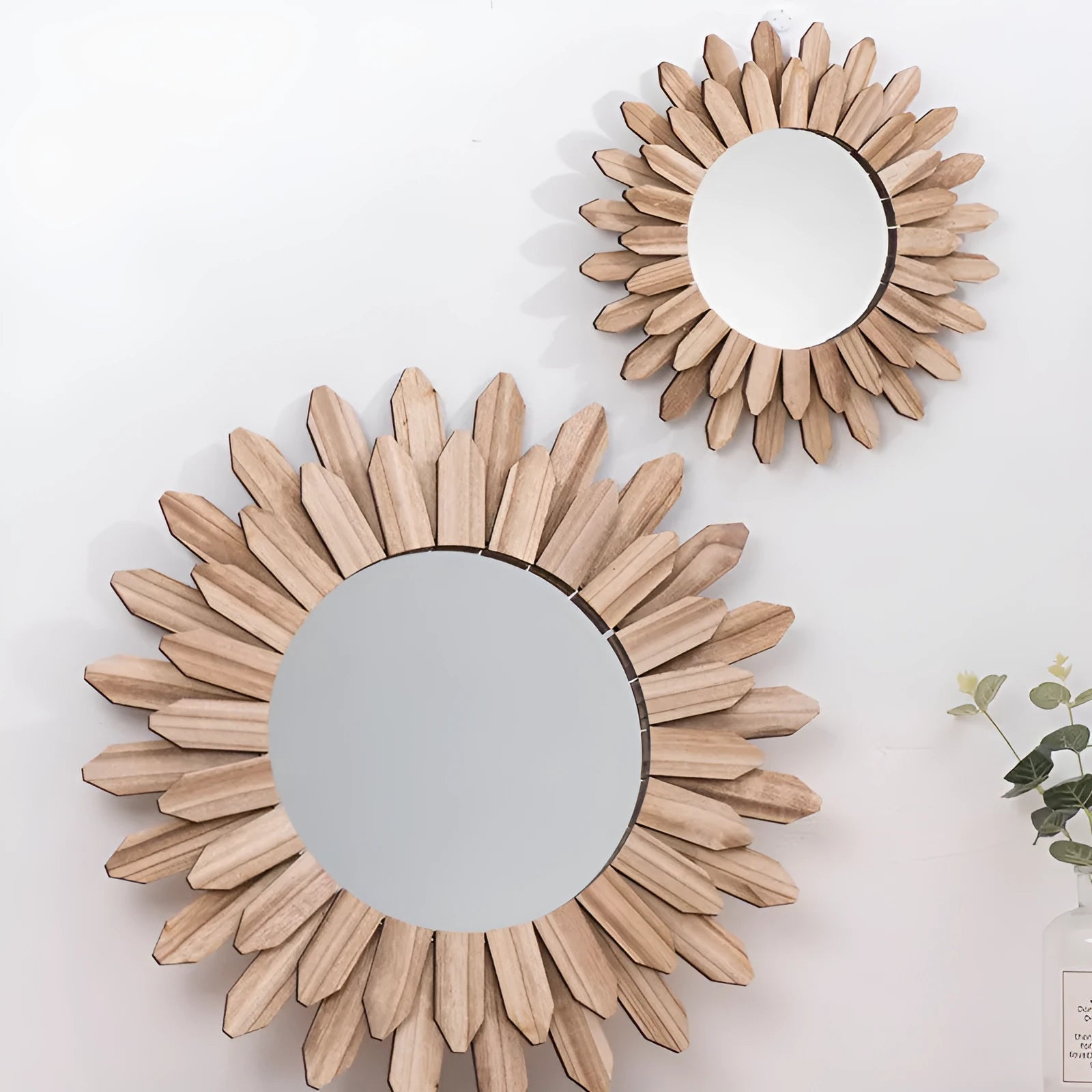 European style solid wood round hanging mirror in baked colour finish on a wall.