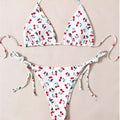 Women's split halter bikini swimsuit in solid colour with adjustable ties