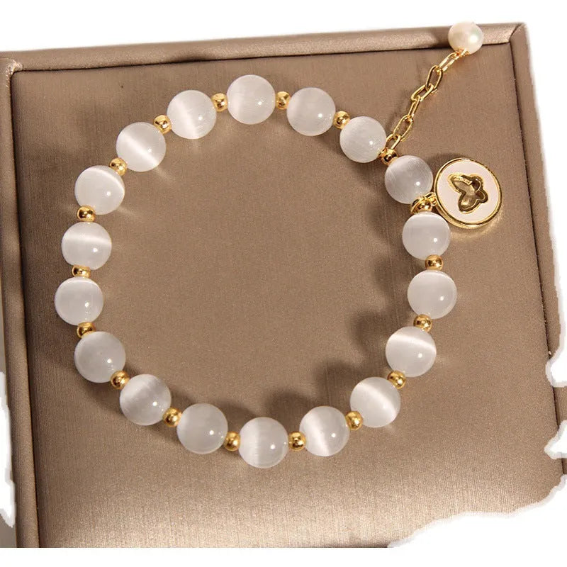 White crystal bracelet with geometric design and cat's eye stones in Korean style