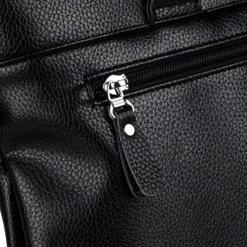 Men's black and brown PU leather messenger bag with splicing design and crossbody strap