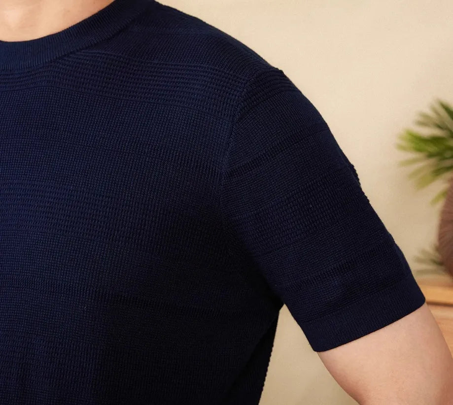 Men's retro-style short-sleeved cotton T-shirt on a hanger, shown in off-white and royal blue colour options.