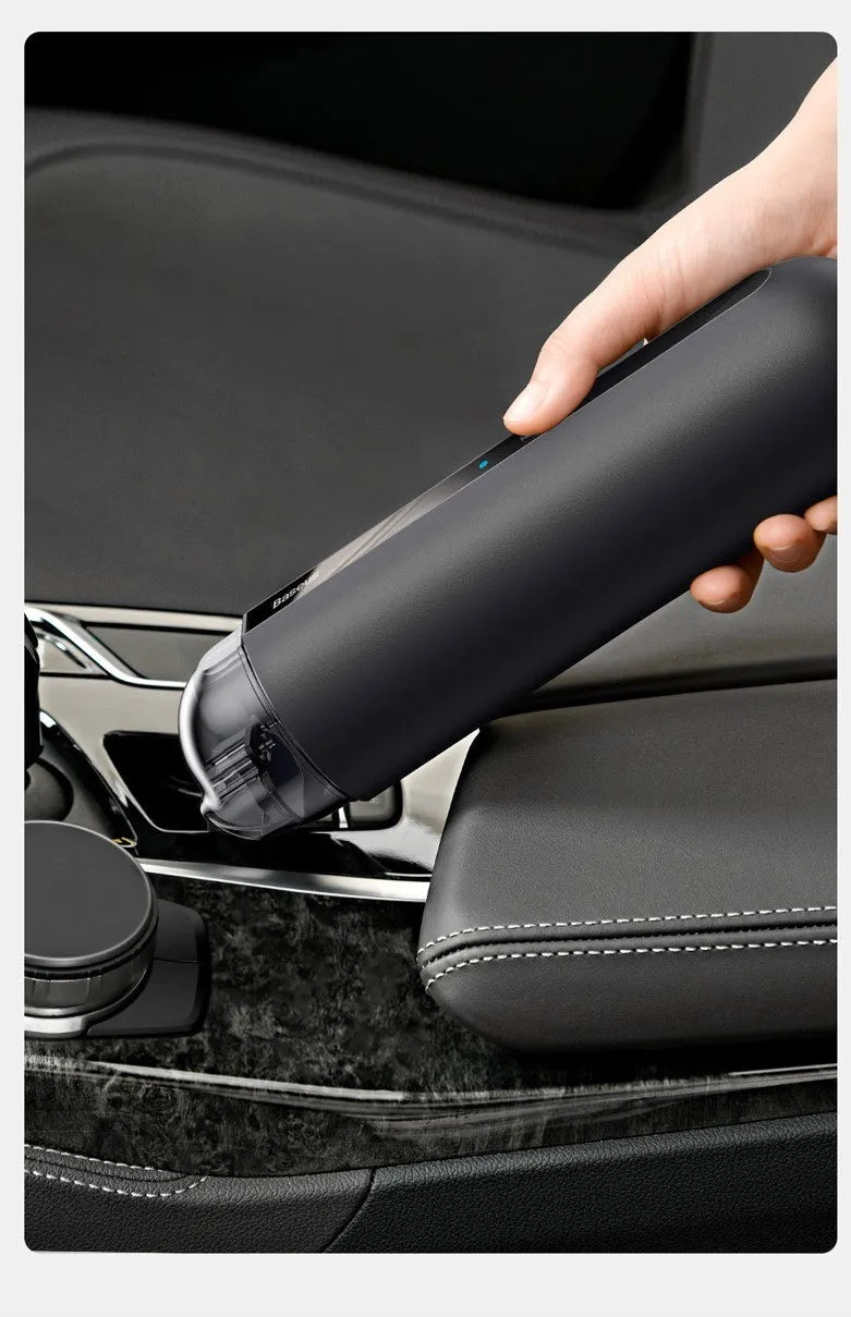 Baseus wireless handheld car vacuum cleaner in black, white, or green with blowing hose accessory.