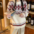 Loose retro striped pullover knitted top in red or white colour with long sleeves.