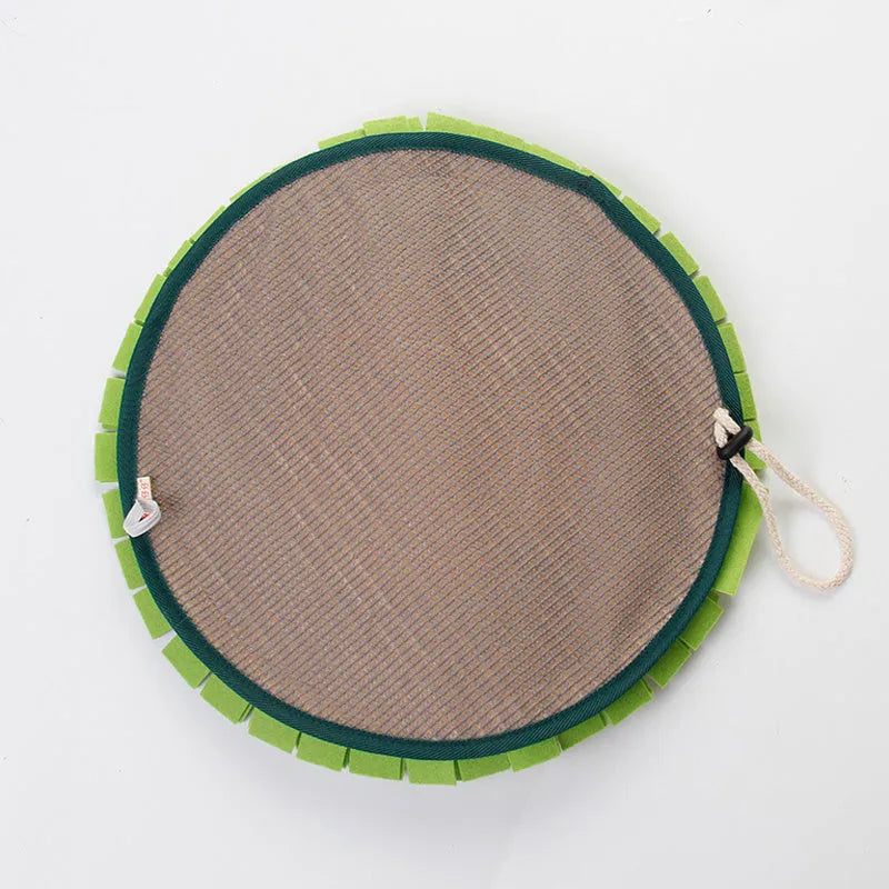 Plush dog sniffing pad toy in photo colour on a soft surface for bite play