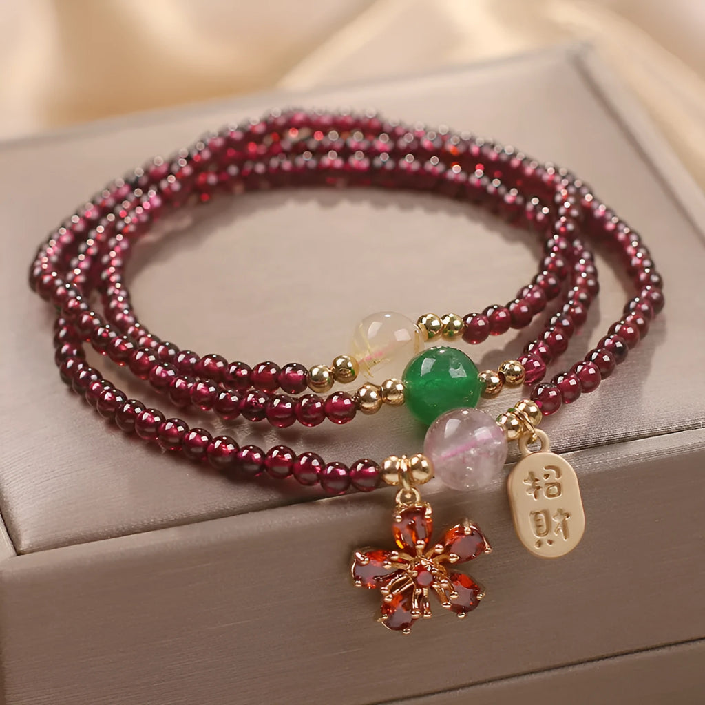 Natural crystal women's bracelet in pomegranate red cherry blossom colour with sequin detail