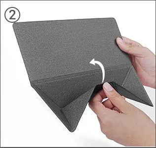 Blue or grey portable foldable laptop cooling stand bracket with anti-slip pads on a flat surface.