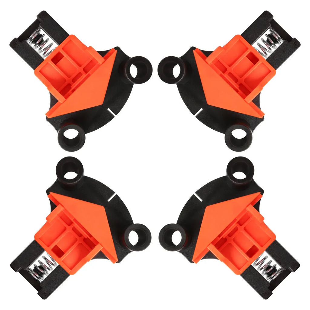 Set of four plastic right-angle clamps for woodworking and picture frame assembly.
