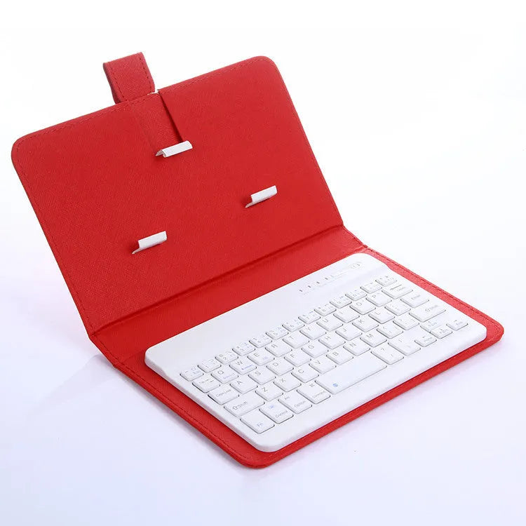 Black Bluetooth keyboard inside a leather holster case for mobile phones, shown with phone stand function engaged.