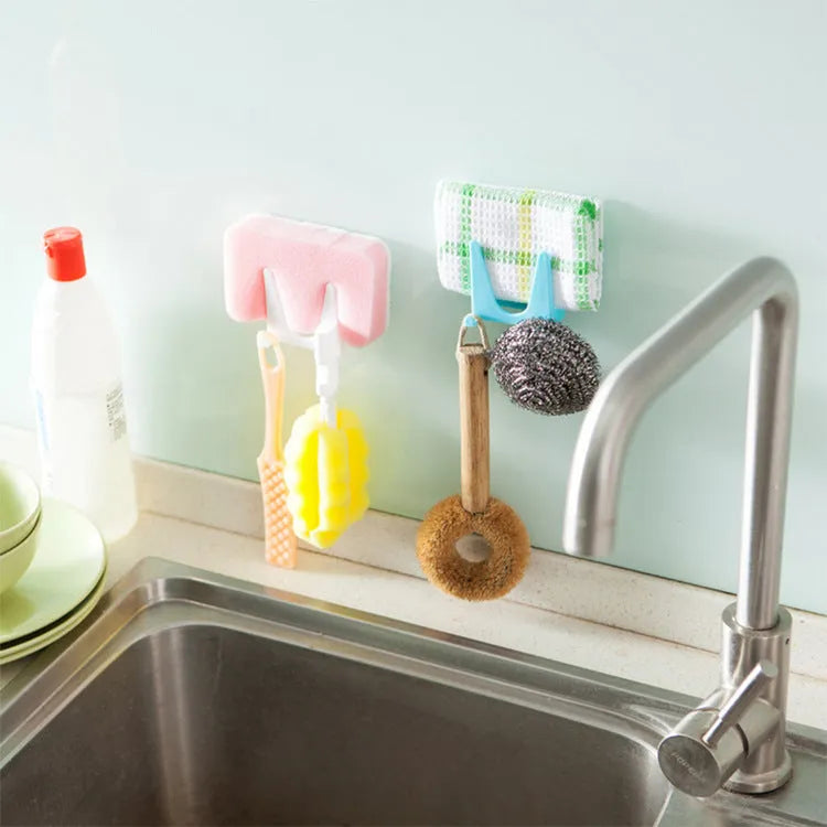 Wall-mounted PP plastic kitchen lid holder in blue, green or white, stuck inside a cabinet for lids and utensils.