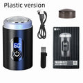 Black portable USB rechargeable shaver with LED display, shown with cleaning brush and cable.