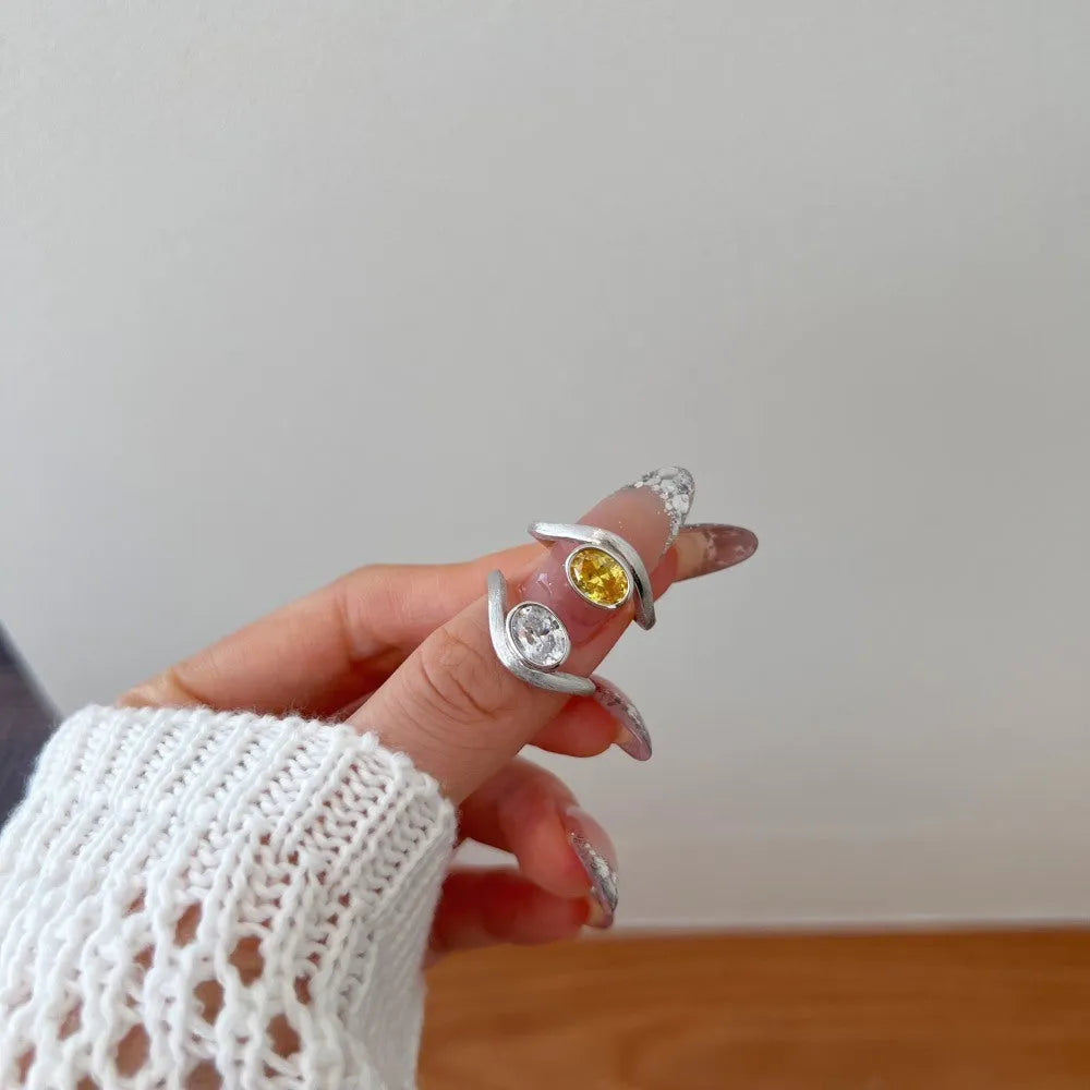 Women's simple oval silver ring electroplated platinum white diamond colour on white background