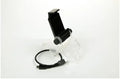 Black PS4 controller phone clip holding a mobile phone, with an OTG USB cable connected