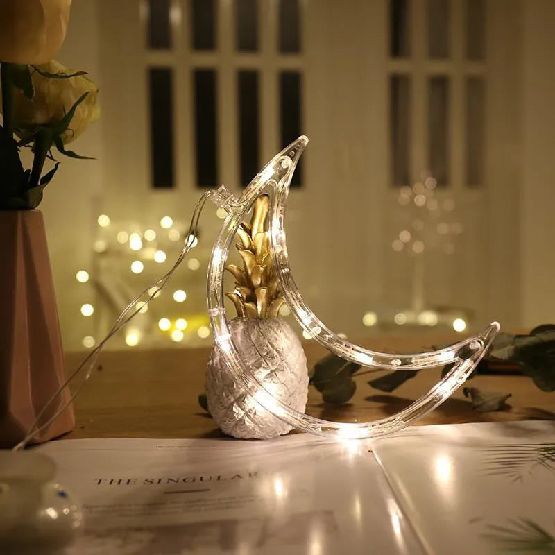 LED Christmas suction cup chandelier with Santa, elk, and snowman designs on window