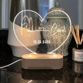 Custom acrylic night light with personalised names and date, showing dimensions of 20cm by 11.5cm.