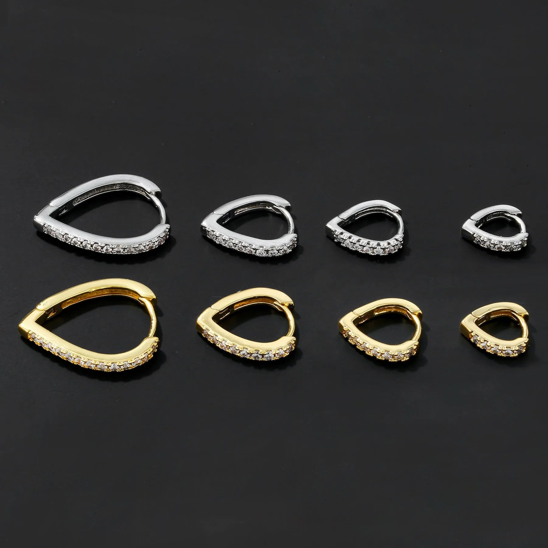 Gold and white geometric heart-shaped copper ear clip for women.