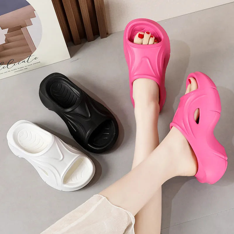 Women's thick-soled EVA foam slippers in rose red colour with round toe design