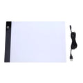 LED artist tracing table with acrylic panel and USB power, showing dimming function on a drawing surface