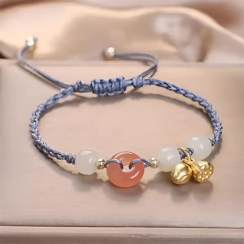 Hetian Jade constellation bracelet with two buckle closures on an adjustable strap.