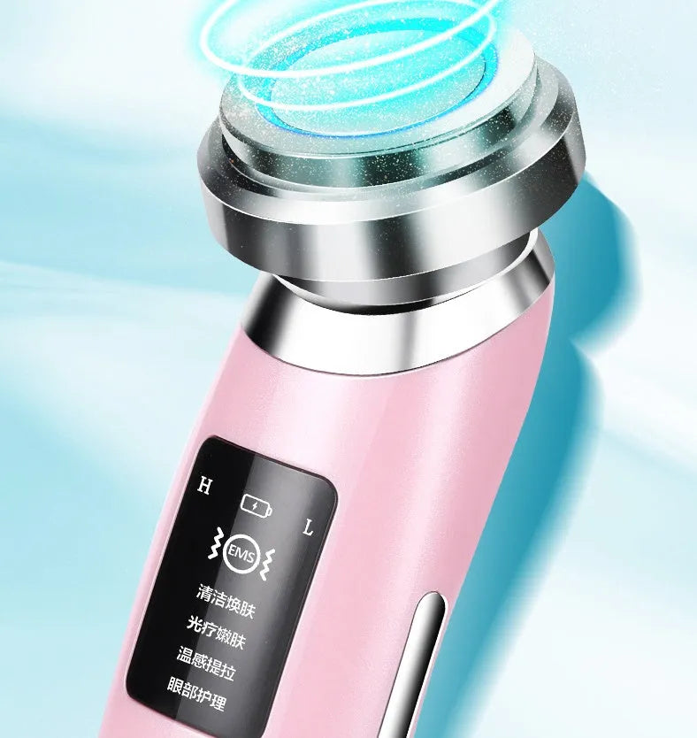 Pink USB-rechargeable facial cleansing beauty instrument measuring 185mm long