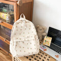 Floral nylon school backpack for girls, 20-35L breathable summer simplicity bag in tulip, floral, and small flower style.