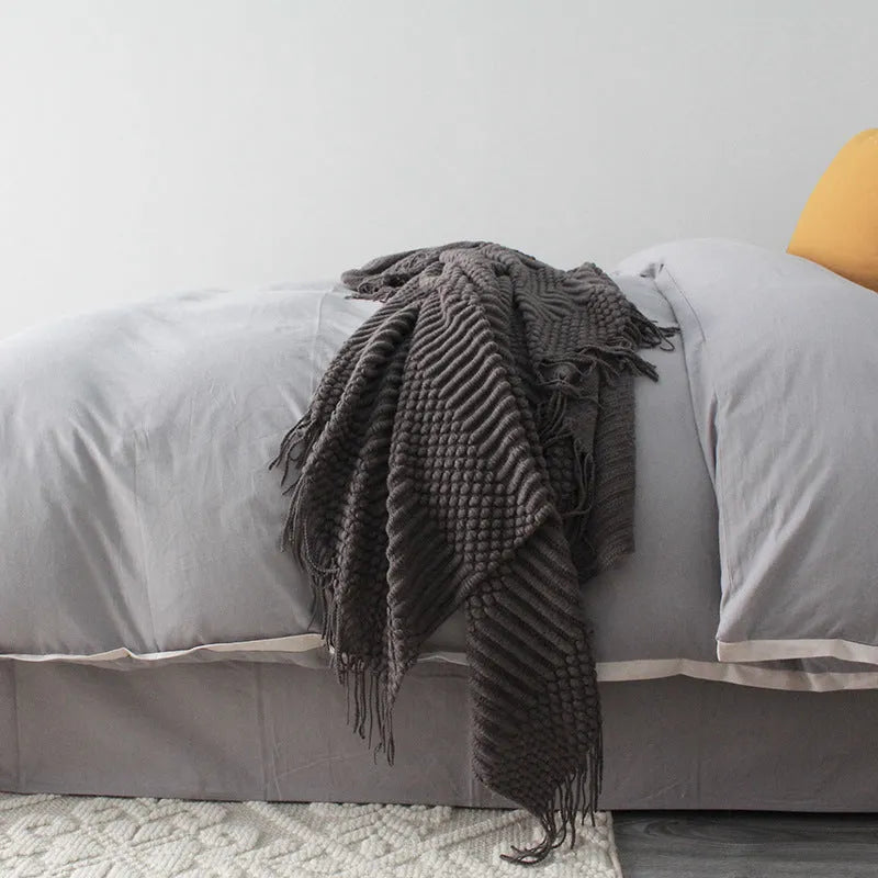 Soft grey polyester baby blanket laid flat, showing 127x170cm size for crib or pram naps.