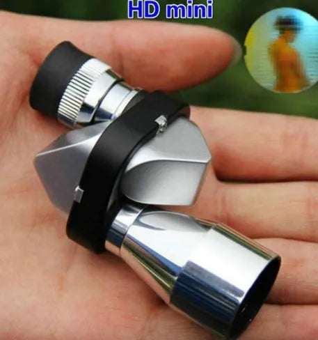 Compact aluminium alloy monocular telescope with 8x20mm lens, folding eye cup, and included cleaning cloth.