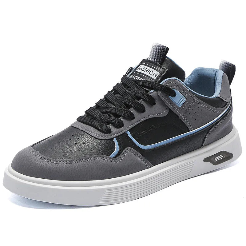 Men's solid colour canvas board shoes with leather stitching and a low-top design.