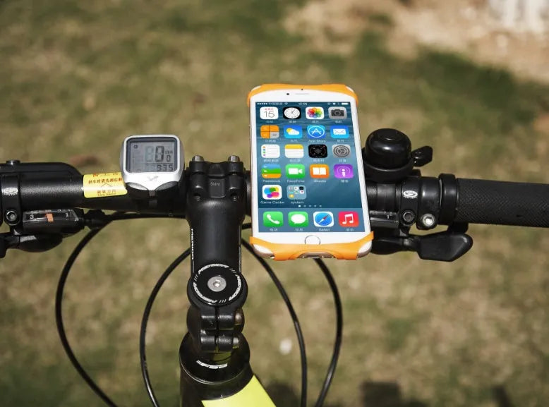 Silicone bicycle phone holder mounted on handlebars showing three adjustment holes