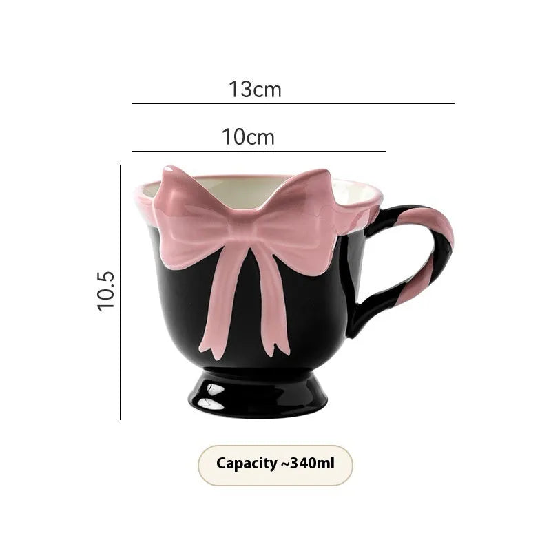 Ceramic mug with girl heart bow design in black pink or white powder colours, 301-400ml capacity