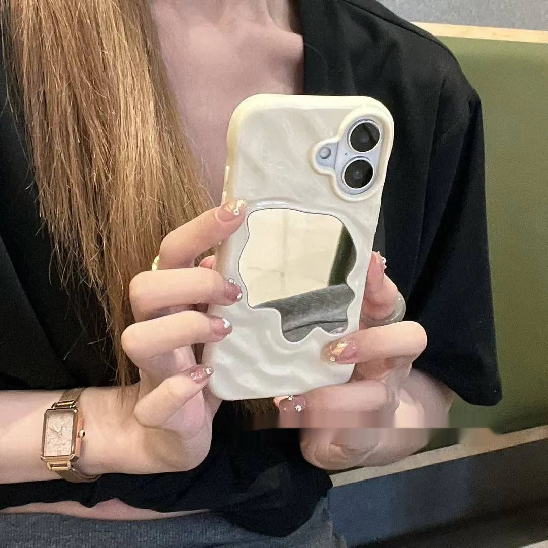 Water ripple solid colour mirror iPhone case in beige, shown on an iPhone