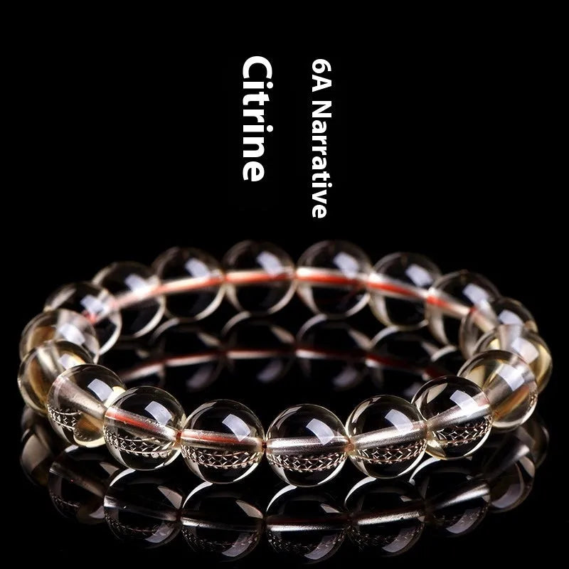 Natural citrine scattered beads ball bracelet showing polished beads in 7A and 6A colour grades.
