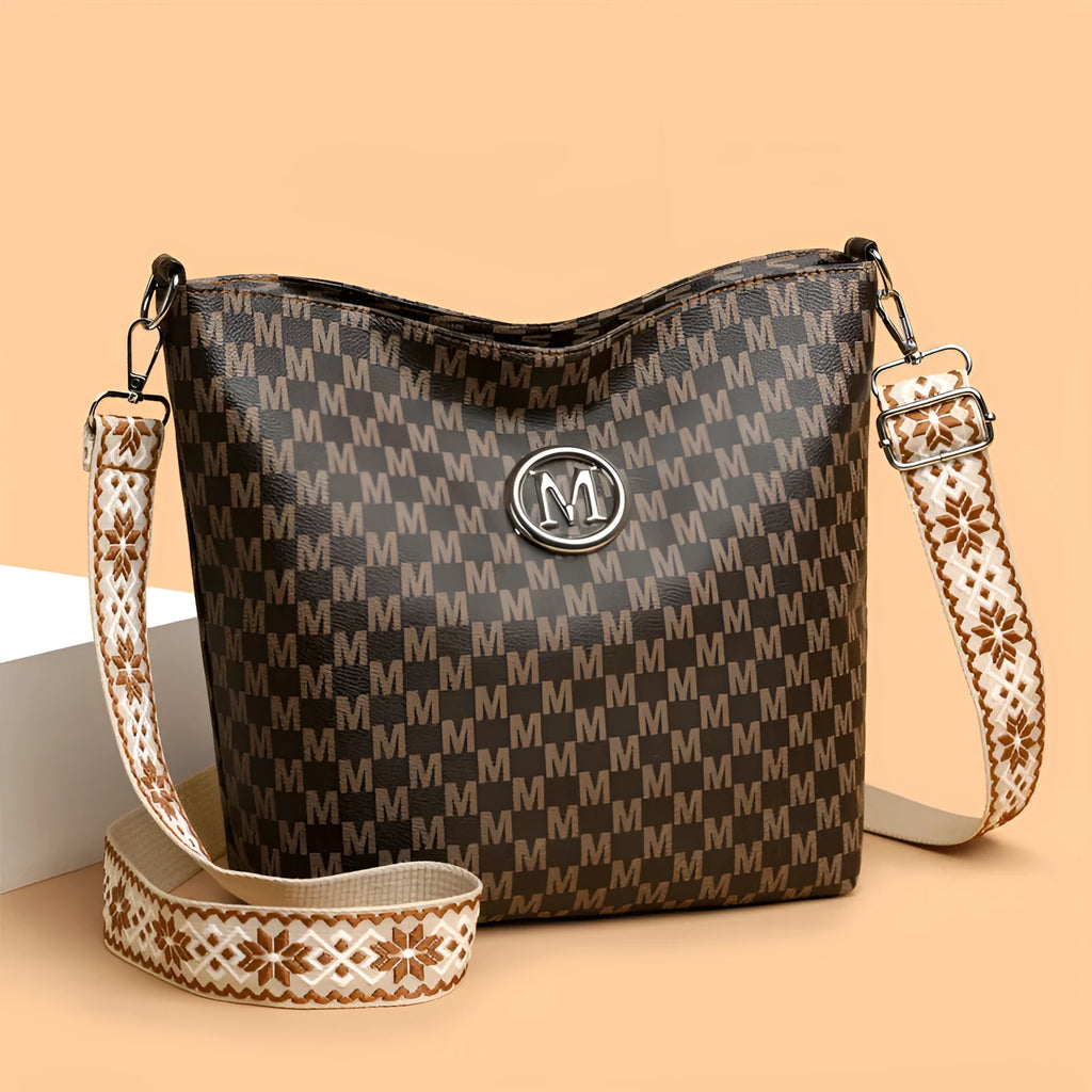 PU leather retro dumpling-shaped shoulder bag in black, brown and white colours with sandwich pocket design
