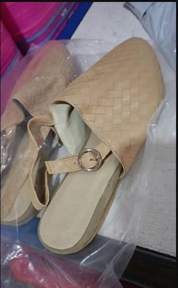 Baotou flat sandals with a buckle strap and pointed toe in multiple colour options.