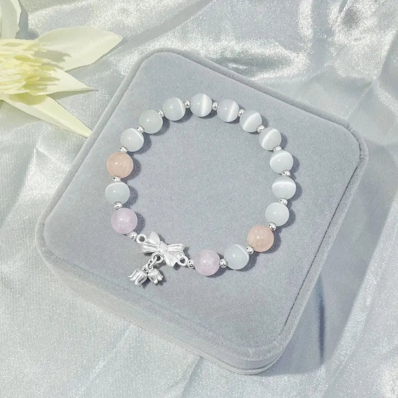 Lavender purple bowknot crystal bracelet with opal elements measuring 10mm