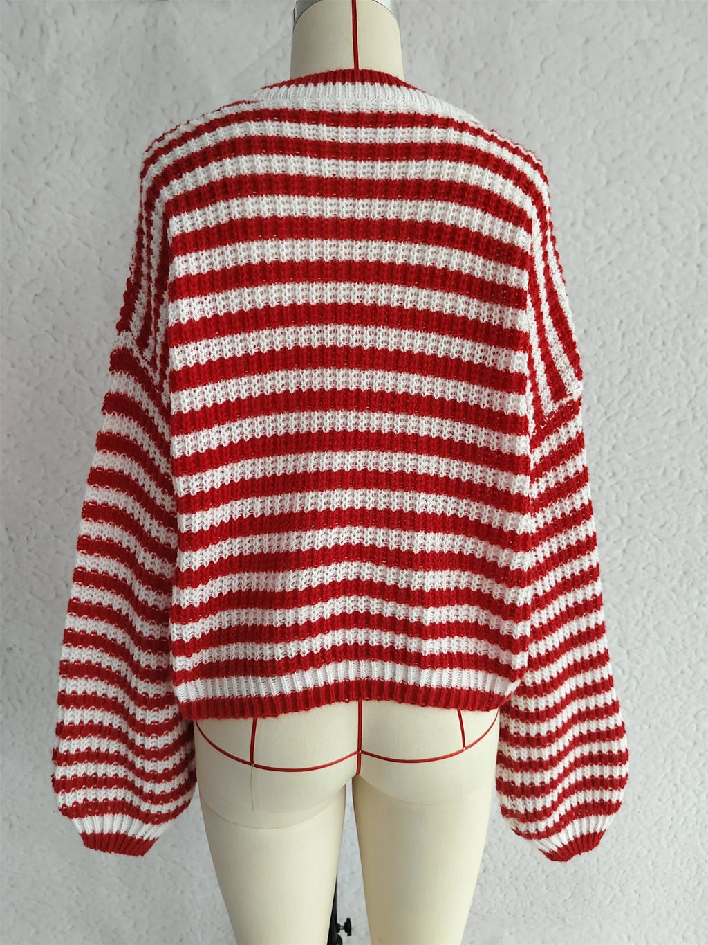 Women's vintage stripe knitted pullover sweater in a loose fit, shown in a choice of colours.