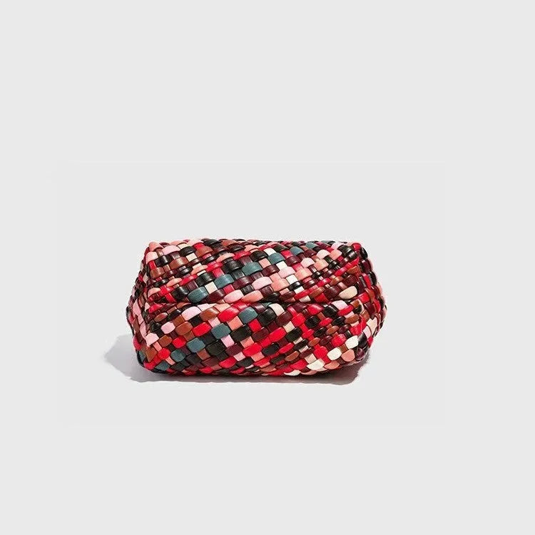 Colourful women's woven shoulder bag made from PU leather with braided texture.
