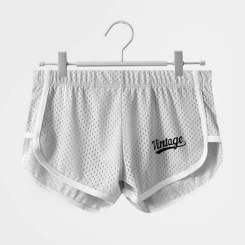 Men's solid colour ice silk boxers in mid waist design, shown in one of six available colours.