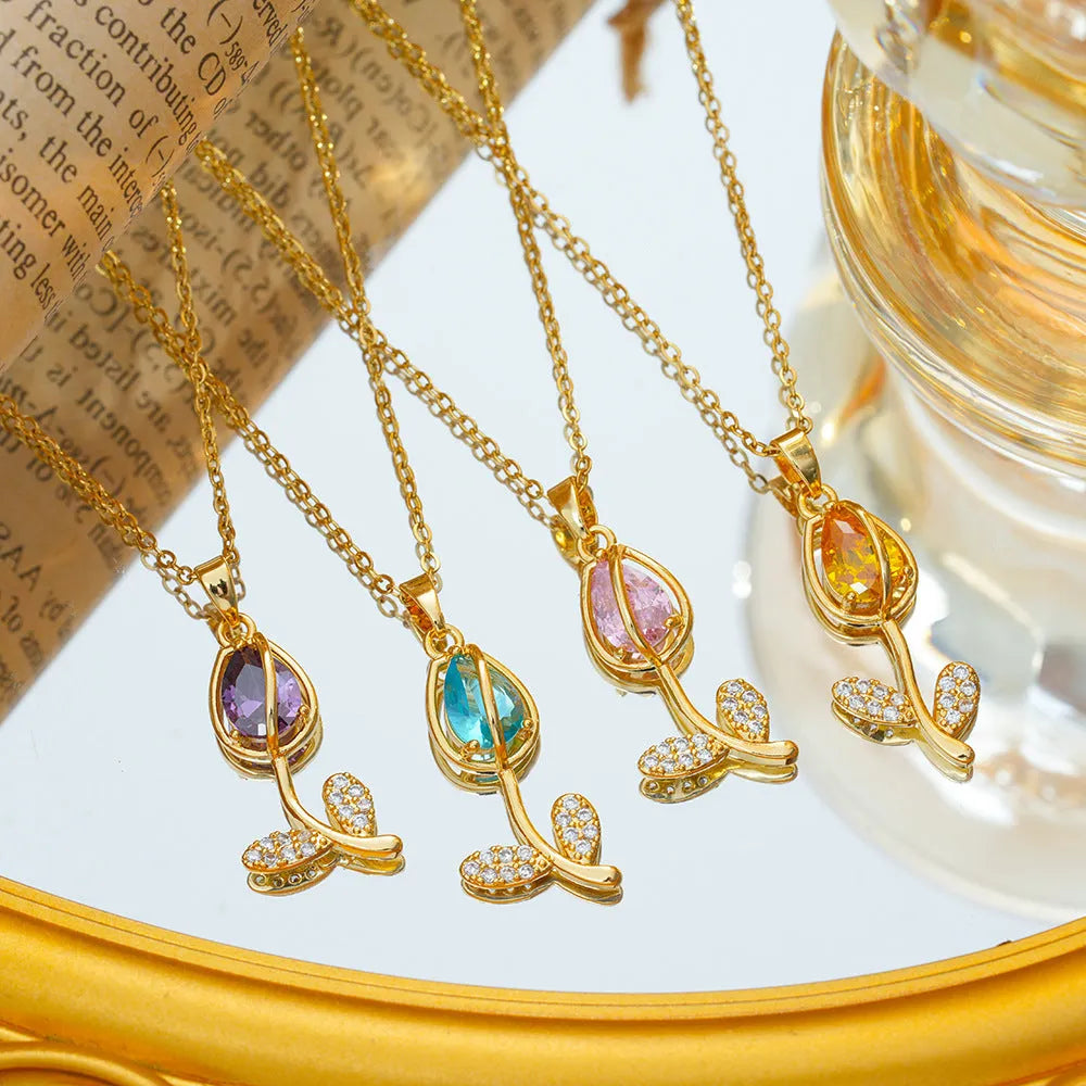 Zircon tulip pendant necklace for women in gold tone on a titanium steel chain.