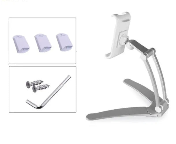 Silver aluminium alloy desktop stand holding a tablet at an angle, with adjustable clips and a white mounting base.