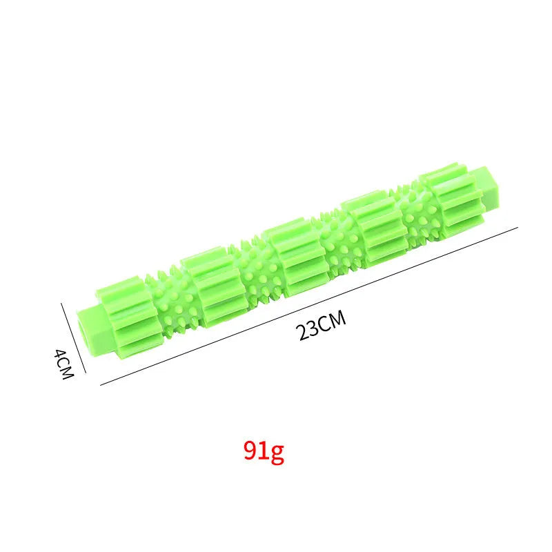 Green and orange durable rubber dog chew toy with treat hole and squeaker for aggressive chewers