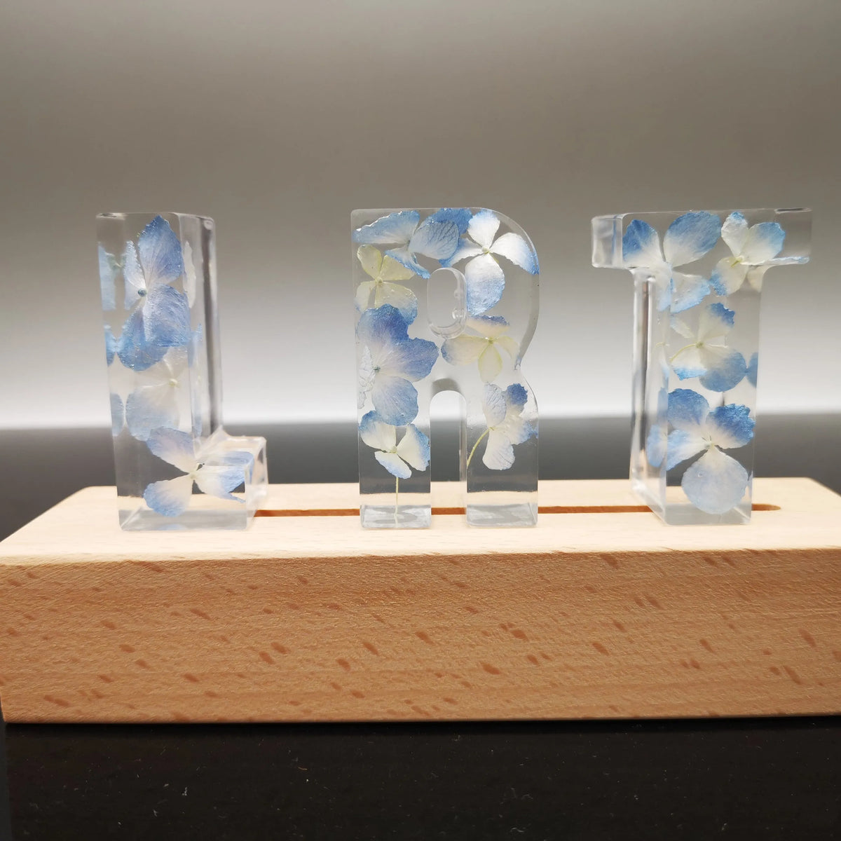 Dried flower English alphabet night light base table in white crystal epoxy resin