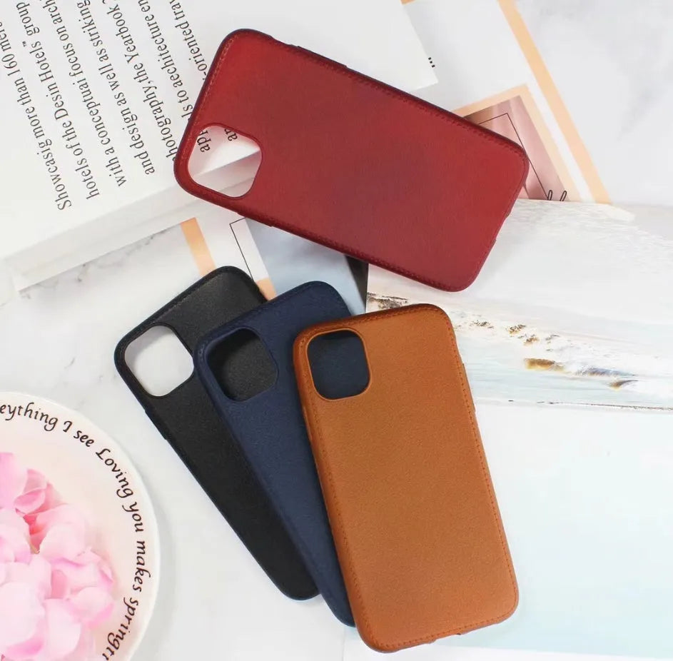 Leather and TPU iPhone case shown in black, brown, navy blue, and wine red colours for multiple Apple models.