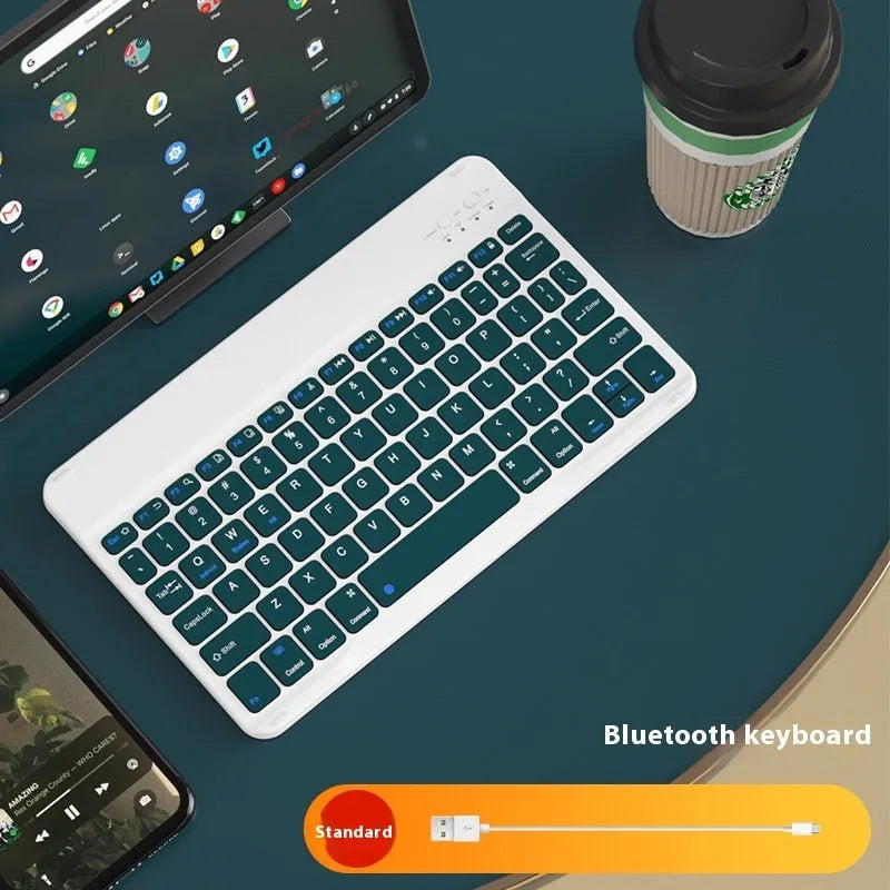 Bluetooth keyboard and rechargeable mouse set for tablet in elegant white on a desk