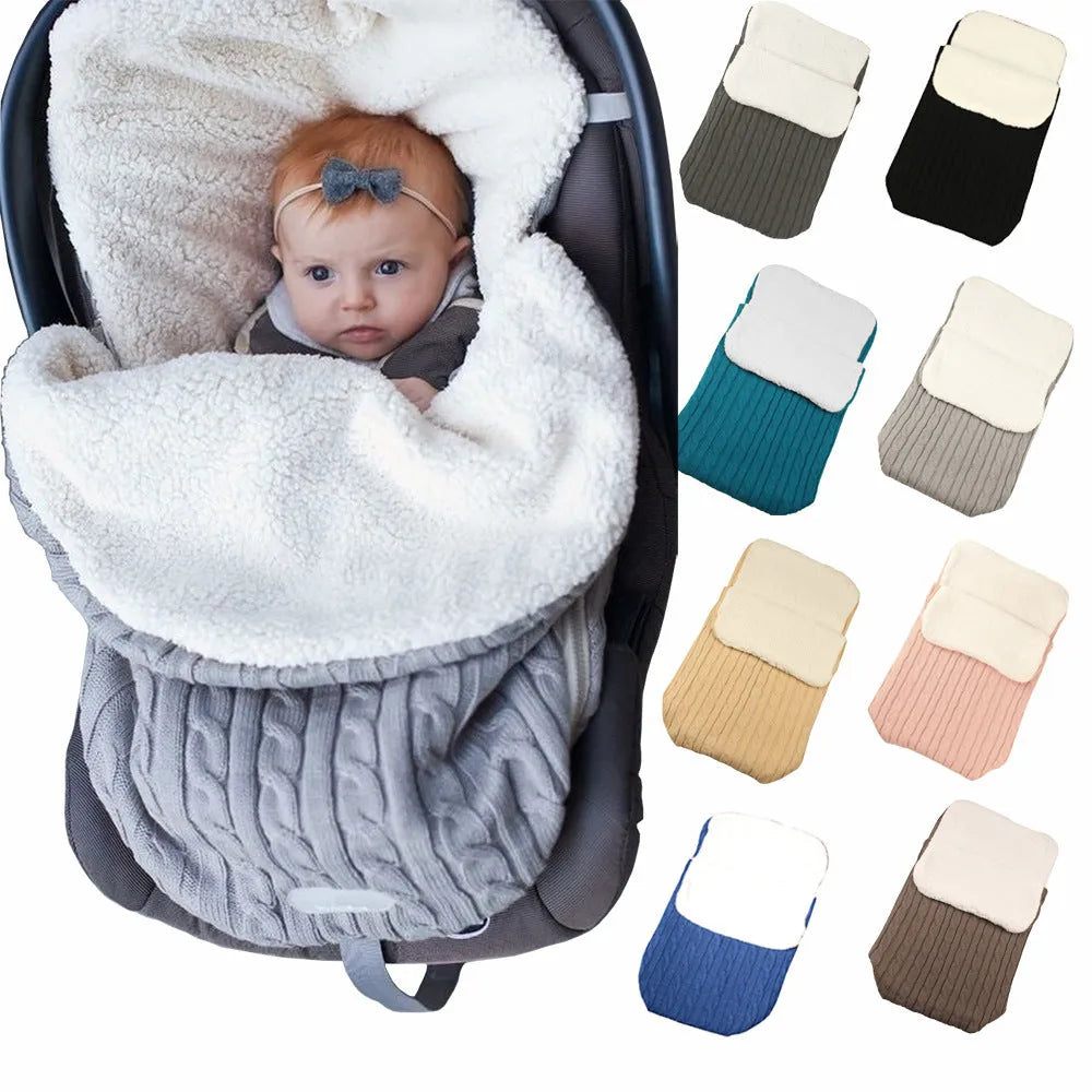 Envelope-style baby stroller sleeping bag in a plain colour, shown on a pram with lamb cashmere lining visible.